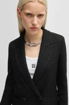 Chaqueta relaxed fit en bouclé con efecto brillante