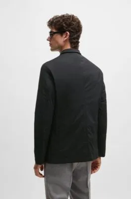 Chaqueta slim fit de tejido antidesgarros con elástico