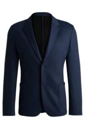 Chaqueta slim fit en sarga elástica jaspeada de alto rendimiento