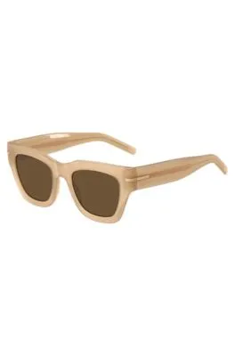 Gafas de sol de acetato beige con detalle dorado de la marca