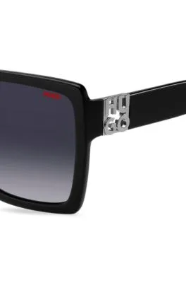 Gafas de sol de acetato negro con logo apilado