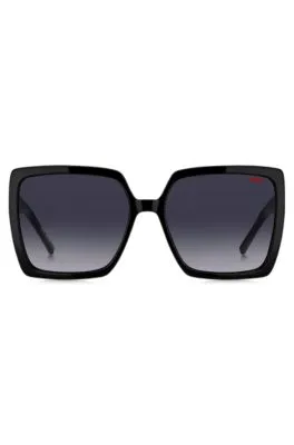 Gafas de sol de acetato negro con logo apilado