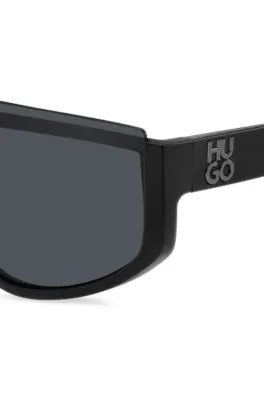 Gafas de sol estilo máscara negras con logo apilado