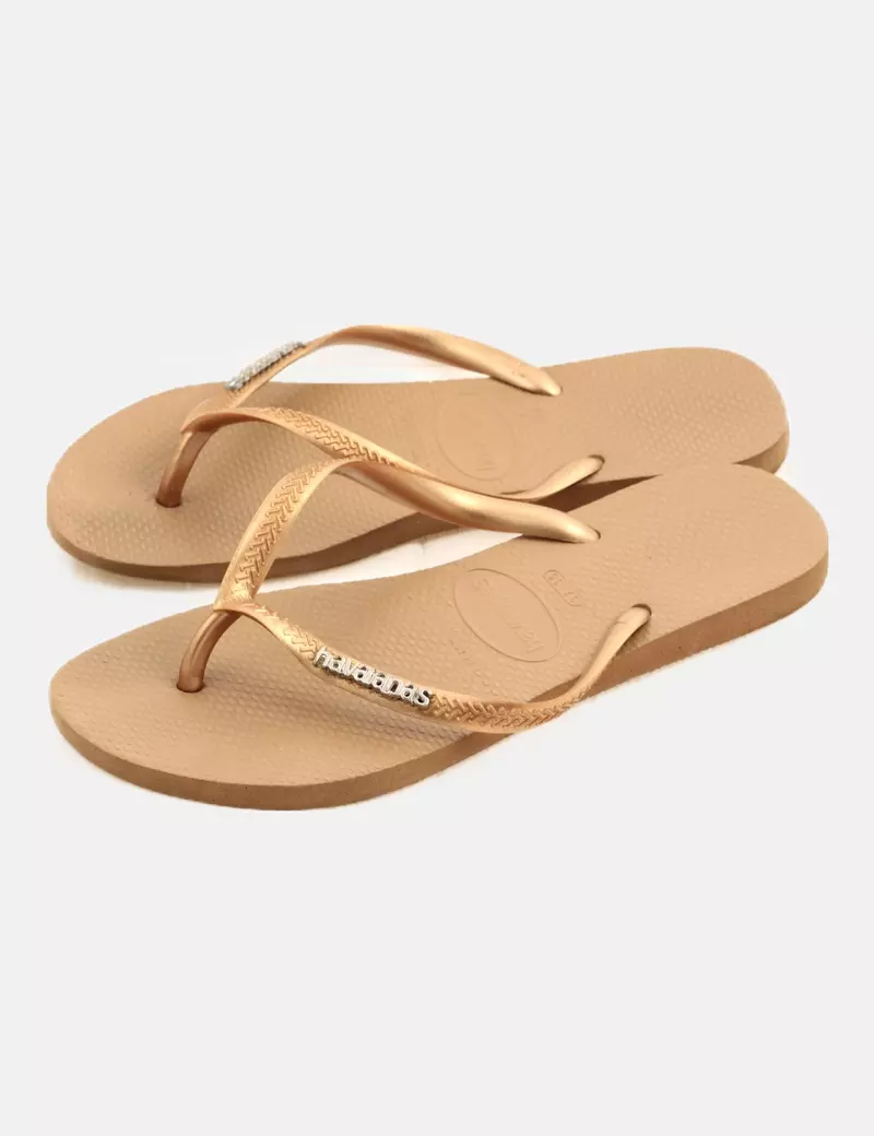 Havaianas Chanclas planas doradas