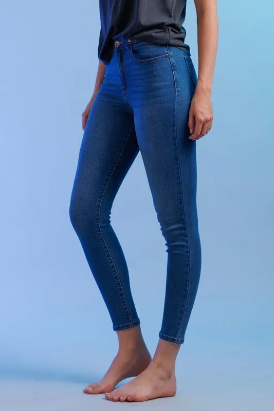 Jeans skinny talle medio con detalles rasgados Enjean