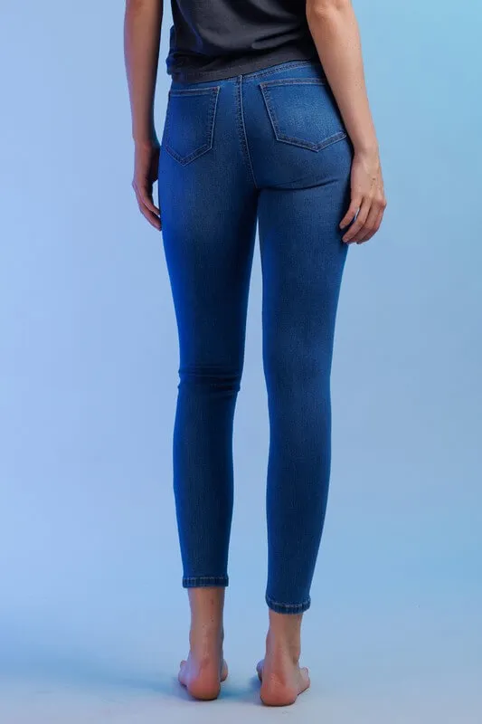 Jeans skinny talle medio con detalles rasgados Enjean