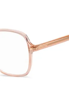 Montura para gafas graduadas de acetato rosa con detalles metálicos dorados