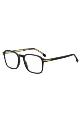 Montura para gafas graduadas en acetato negro con detalles en tono dorado