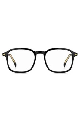 Montura para gafas graduadas en acetato negro con detalles en tono dorado