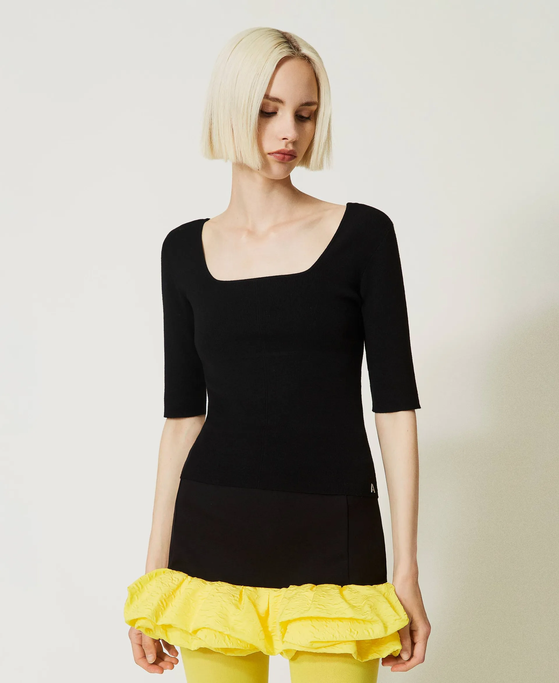 Pull avec insertions en tulle