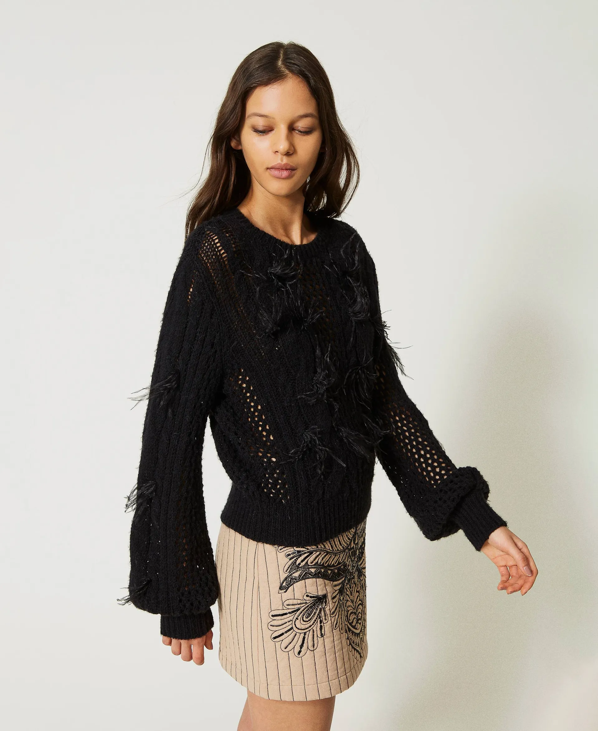 Pull en laine et alpaga avec plumes